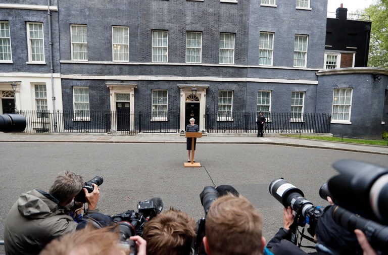 British Prime Minister Theresa May speaks to the media outside 10 Downing Street after returning from visiting Queen Elizabeth II at Buckingham Palace, in London where she asked for the dissolution of Parliament ahead of the upcoming general election, Wednesday, May 3, 2017. (AP Photo/Kirsty Wigglesworth)