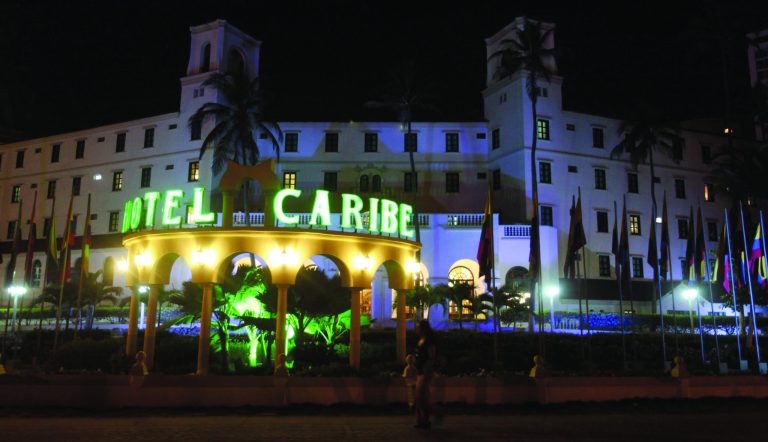 FILE - In this April 19, 2012, file photo, people walk past Hotel El Caribe in Cartagena, Colombia. Seven Army soldiers and two Marines have received administrative punishments, but are not facing criminal charges, for their part in the Secret Service prostitution scandal in Colombia this year, The Associated Press has learned. U.S. officials said that one Air Force member has been reprimanded but cleared of any violations of the Military Code of Justice. And final decisions are pending on two Navy sailors, whose cases remain under legal review. (AP Photo/Pedro Mendoza, File)