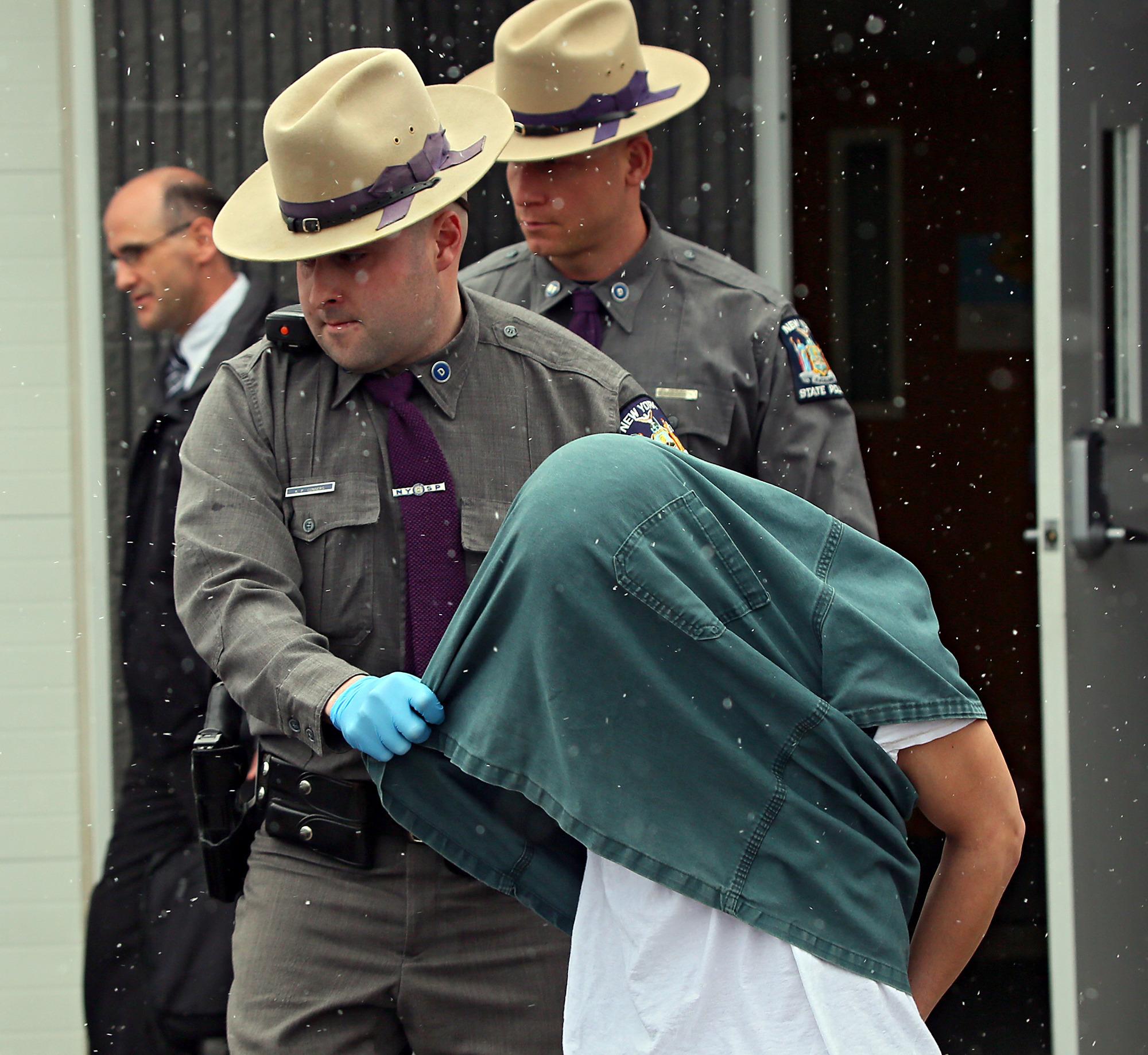 NY murder-rape suspect removed monitor quickly