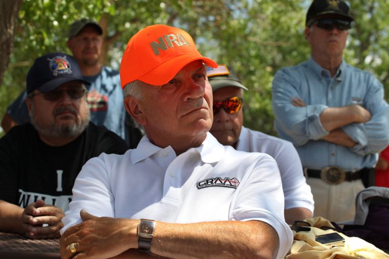 Colorado candidate for governor Tom Tancredo wears an NRA hat during a gun rights rally. (AP/Brennan Linsley)
