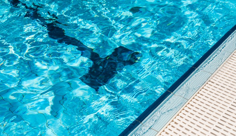 Washington state police and DHS officers served a search warrant to Sean Hutchinson, 46, who resigned from his coaching position in 2010 over speculation he was sexually involved with a swimmer. (iStock photo)