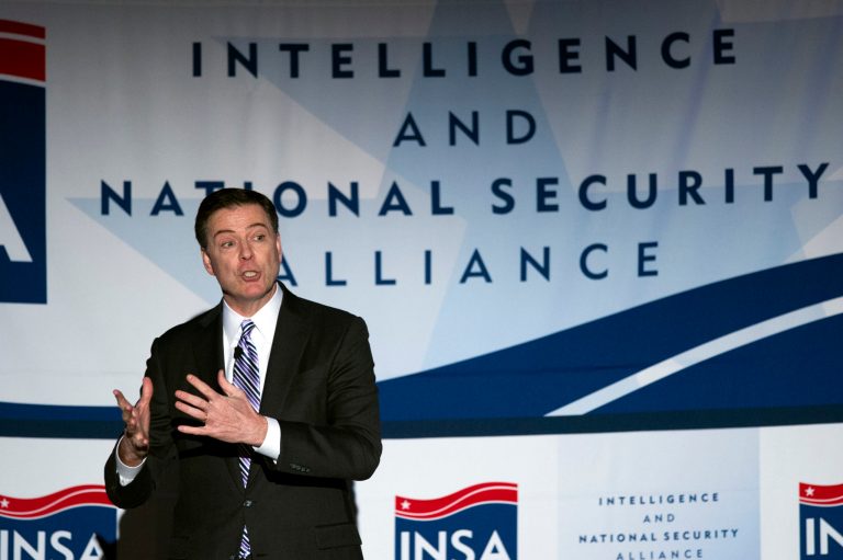 FBI Director James Comey addresses the Intelligence and National Security Alliance Leadership Dinner in Alexandria, Va., Wednesday, March 29, 2017. (AP Photo/Cliff Owen)