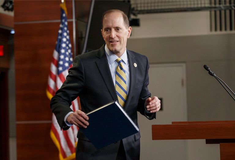 House Ways and Means Committee Chairman Rep. Dave Camp, R-Mich., leaves the podium after a news conference on Capitol Hill in Washington on Wednesday, during which he outlined a major plan to rewrite the nation's tax codes. (AP Photo/J. Scott Applewhite)