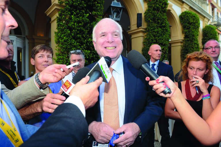 US Senator John McCain answers reporters' questions during a meeting on World Economy in Cernobbio, Italy, Friday, Sept. 7, 2012. Experts and leaders gathered in Italy to discuss the prolonged crisis in a structurally flawed Europe, political dysfunction pushing America off a 'fiscal cliff' and the emerging economies slowdown drying up the last engine of global growth. (AP Photo/Giuseppe Aresu)