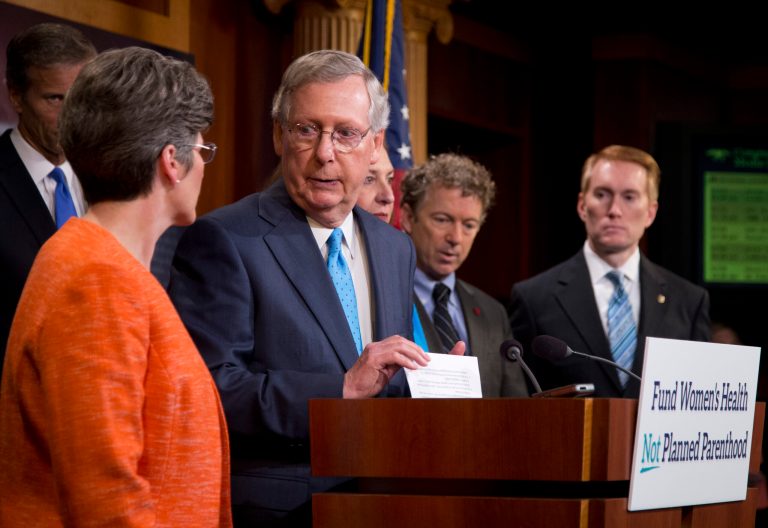 Senate Majority Leader Mitch McConnell of Ky., joined by his fellow Senate Republicans, speaks during a news conference on Capitol Hill to discuss Planned Parenthood. (AP Photo/Manuel Balce Ceneta)