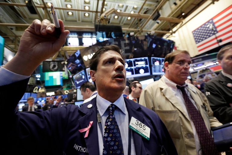 Trader Anthony Carannante, left, works on the floor of the New York Stock Exchange. Major U.S. stock indexes rose in afternoon trading Thursday, April 17, 2014,  as investors reacted to quarterly results from a batch of U.S, companies. Google, IBM and insurer UnitedHealth were among the biggest decliners, while General Electric and Morgan Stanley were among the largest gainers. (AP Photo/Richard Drew, File)