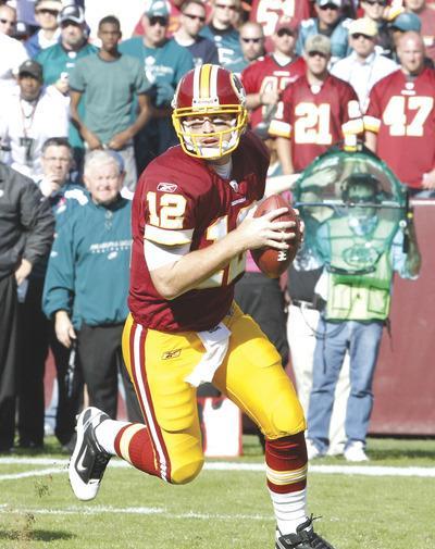 Jennifer Milbrett/The Washington Examiner
John Beck completed eight of 15 passes for 117 yards and ran for 14 more and a touchdown in his first action since 2007.