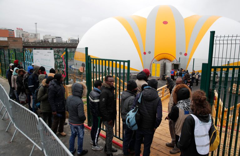 In this Nov. 10, 2016 file photo, migrants arrive at the new reception center in Paris. Samantha Power, the United States' U.N. ambassador says Wednesday Dec.7, 2016 that Western nations may face a security challenge down the road if they fail to do their share in sheltering arriving refugees today(AP Photo/Christophe Ena, File)