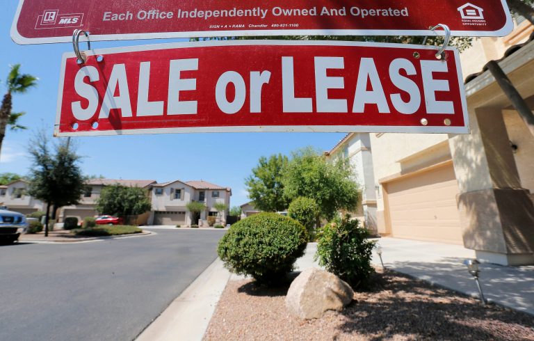   FILE - In this Tuesday, July 30, 2013, file photo, A home is seen for sale Tuesday, July 30, 2013 in Gilbert, Ariz. _ Freddie Mac reports on mortgage rates for the last week of July on Thursday, Aug. 1, 2013. Last week, the average on the 30-year fixed loan fell to 4.31 percent from 4.37 percent the previous week. The average on the 15-year loan fell to 3.39, down from 3.41 percent. (AP Photo/Matt York)  
