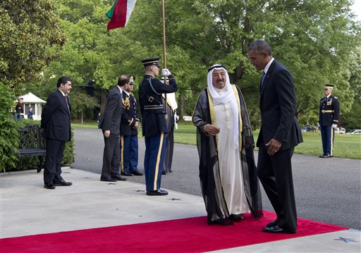President Barack Obama and Sheikh Sabah Al-Ahmed Al-Jaber Al-Sabah, Emir of the State of Kuwait, turn enter the White House as as Sheikh Sabah Al-Ahmed Al-Jaber Al-Sabah, arrives at the South Lawn of the White House in Washington, Wednesday. Gulf nation leaders gathered in Washington to warn President Barack Obama of the risks of completing a nuclear deal with Iran. Obama will try to convince them of the potential benefits for the region. (AP Photo/Carolyn Kaster)Â 