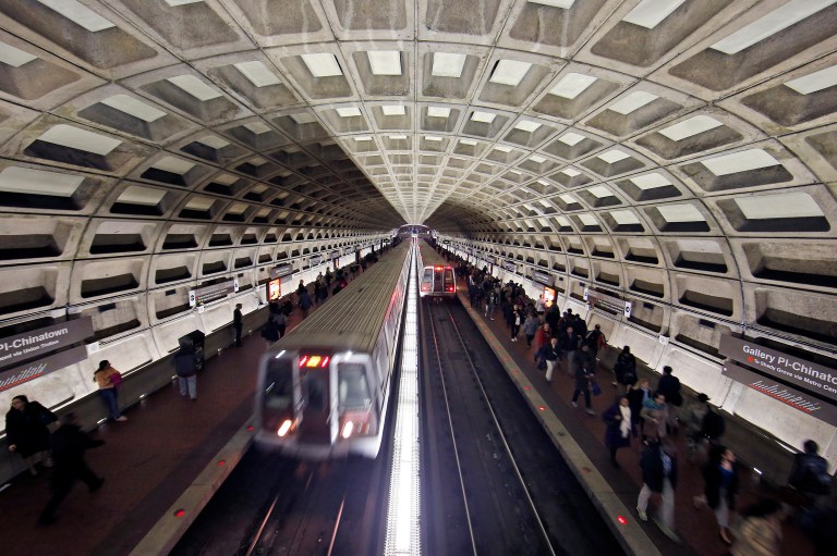 The 36-page report says Metro officials knew of problems with the rail system but did not stop trains to fix the flare-ups. (AP Photo/Alex Brandon)