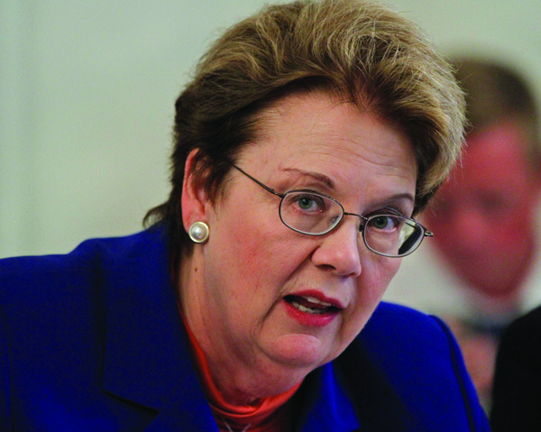 FILE - A June 26, 2012 file photo shows University of Virginia President Teresa Sullivan speaking after she was reinstated by the Board of Visitors in Charlottesville, Va.  The 15-member Board of Visitors voted unanimously to reinstate Sullivan less than three weeks after ousting her in a secretive move that infuriated students, faculty and alumni. (AP Photo/Steve Helber/file)
