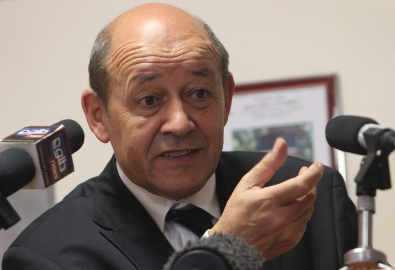   French Defense Minister Jean-Yves Le Drian speaks during a press conference in Kabul, Afghanistan, Monday, June 11, 2012. The defense minister said the recent deaths had not altered France's withdrawal plan, but stressed that some French forces would stay to help train Afghan security forces and help manage the airport in Kabul. About 1,400 French soldiers are expected to remain. (AP Photo/Musadeq Sadeq)  