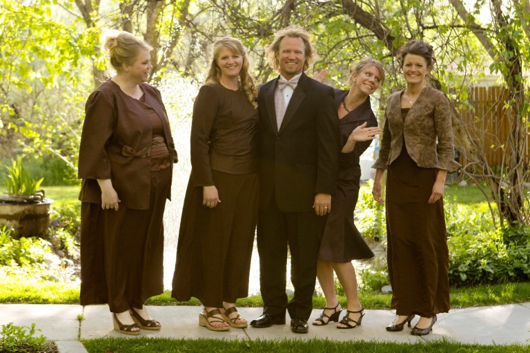 Kody Brown, center, poses with his wives, from left, Janelle, Christine, Meri, and Robyn in a promotional photo for TLC's reality TV show, 