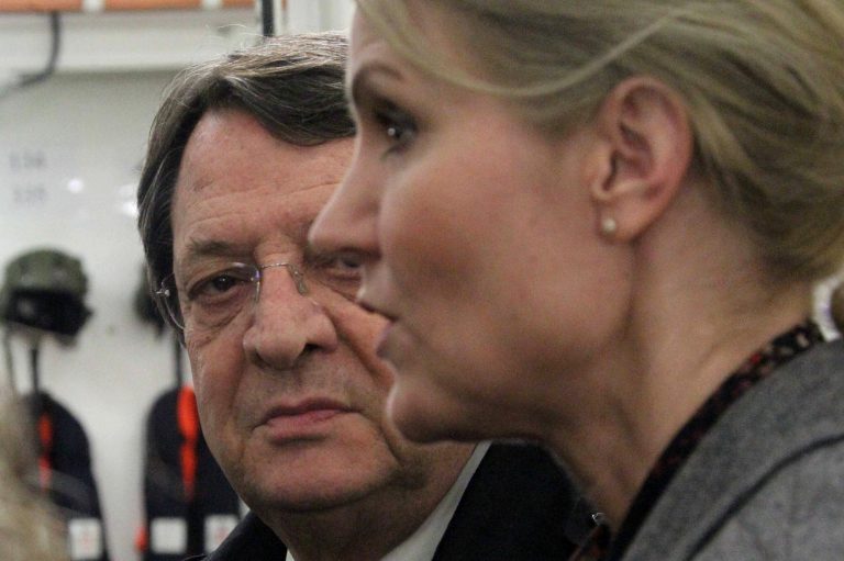 Cyprus President Nicos Anastasiades looks the Prime Minister of Denmark, Helle Thorning Schmidt as she speaks to the media aboard the Danish frigate HDMS Esbern Snare at the Cypriot port of Larnaca on Wednesday, Feb. 19, 2014. Thorning-Schmidt visited the frigate which is part of a joint Danish-Norwegian operation tasked with ferrying Syria's chemical weapons out of the strife-torn country. (AP Photo/Press and Information Office)