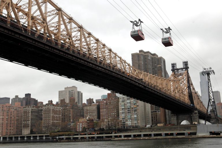 Like the Roosevelt Island Tramway in New York City, the proposed D.C. gondolas would require redundant rescue power and drive systems would likely need to be installed to bring the cars back to the station in the event of an emergency. (AP Photo)