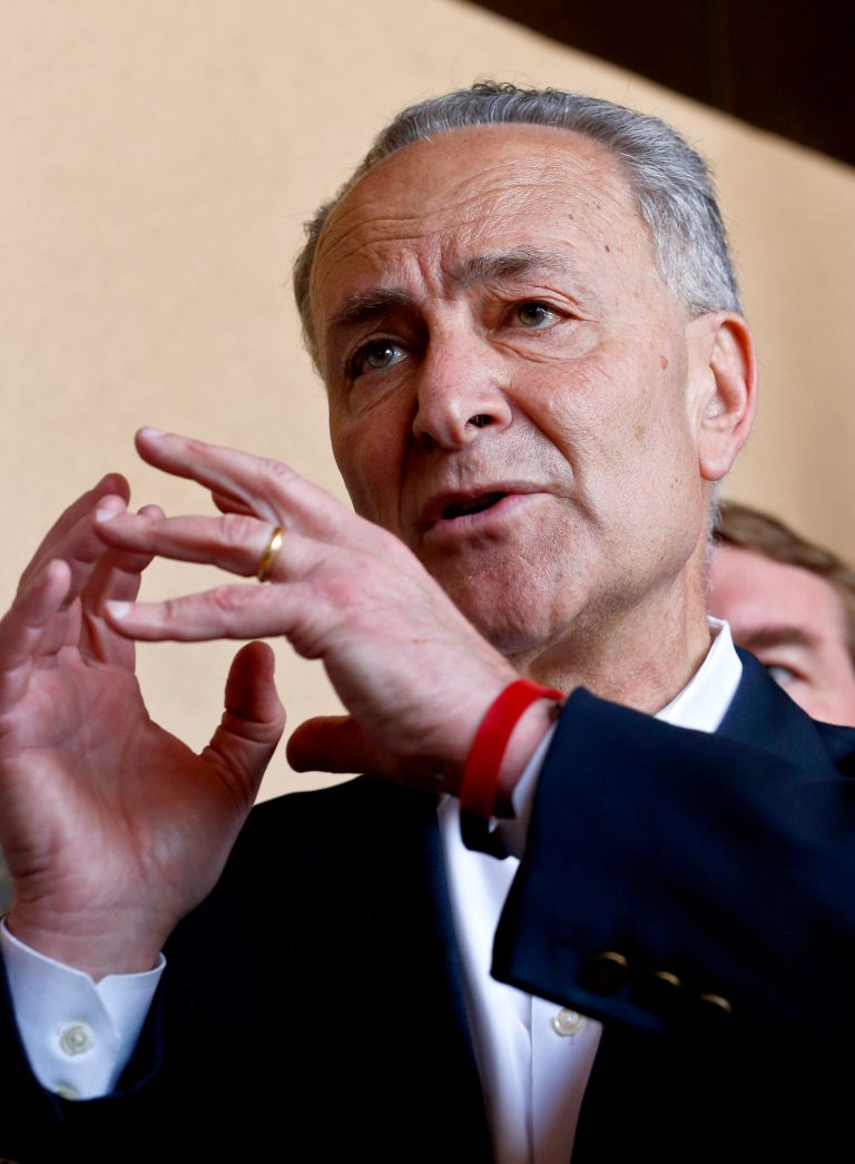 Sen. Chuck Schumer, D-N.Y., makes a point as he is joined by Sen. John McCain, R-Ariz., Sen. Jeff Flake, R-Ariz., and Sen. Michael Bennett, D-CO, during a news conference after their tour of the Mexico border with the United States on Wednesday, March 27, 2013, in Nogales, Ariz. A group of influential U.S. senators shaping and negotiating details of an immigration reform package vowed Wednesday to make the legislation public when Congress reconvenes next month. (AP Photo/Ross D. Franklin)