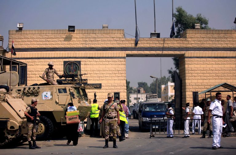   Egyptian army soldiers guard Tora prison, where Egypt's deposed autocrat Hosni Mubarak has been held, in Cairo, Thursday, Aug. 22, 2013. Mubarak has been released from jail and taken to military hospital in Cairo. (AP Photo/Khalil Hamra)  
