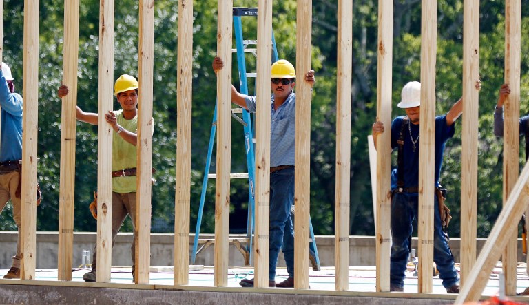 It is true that while all jobs are a cost, some of them are at least worth the expense of having them done. (AP Photo/Rogelio V. Solis)