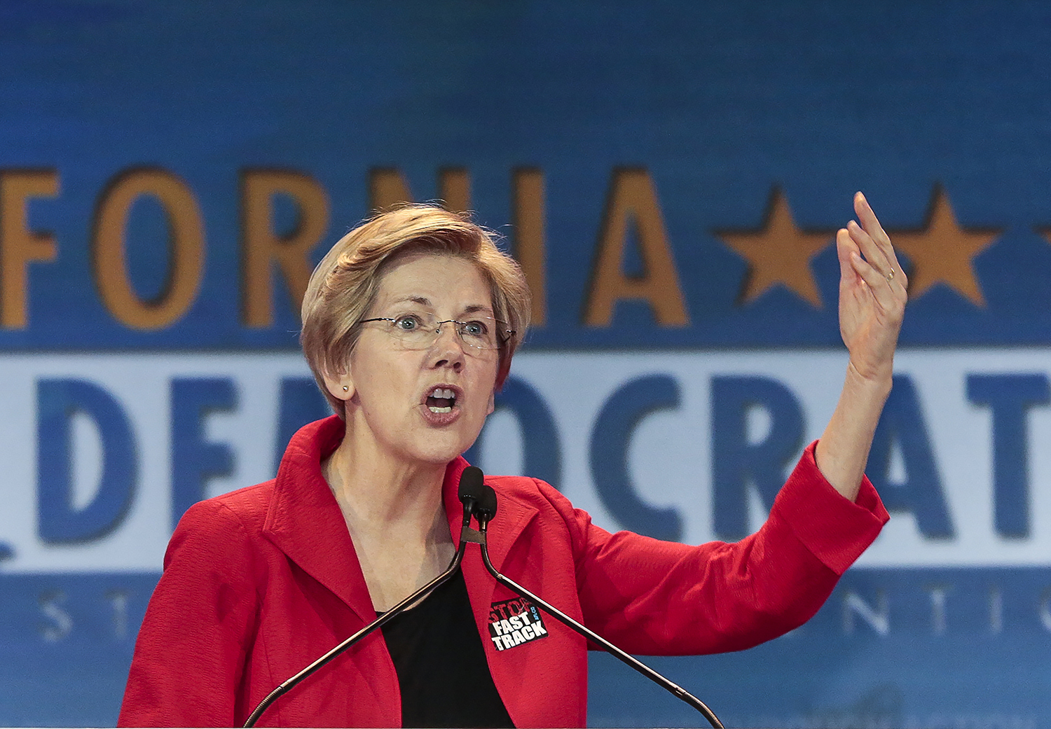 Elizabeth Warren: ‘I’m still cheering Bernie on’
