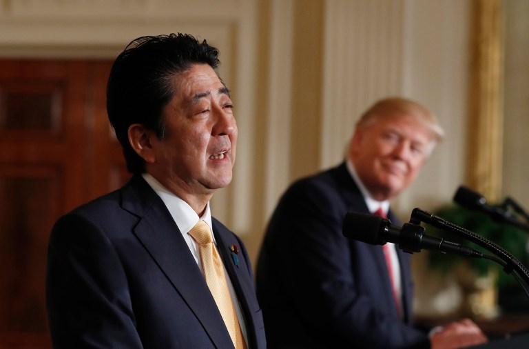 Japanese Prime Minister Shinzo Abe pledged Friday that the U.S. and Japan would strengthen their alliance in the Asia-Pacific to ensure peace. (AP Photo/Carolyn Kaster)