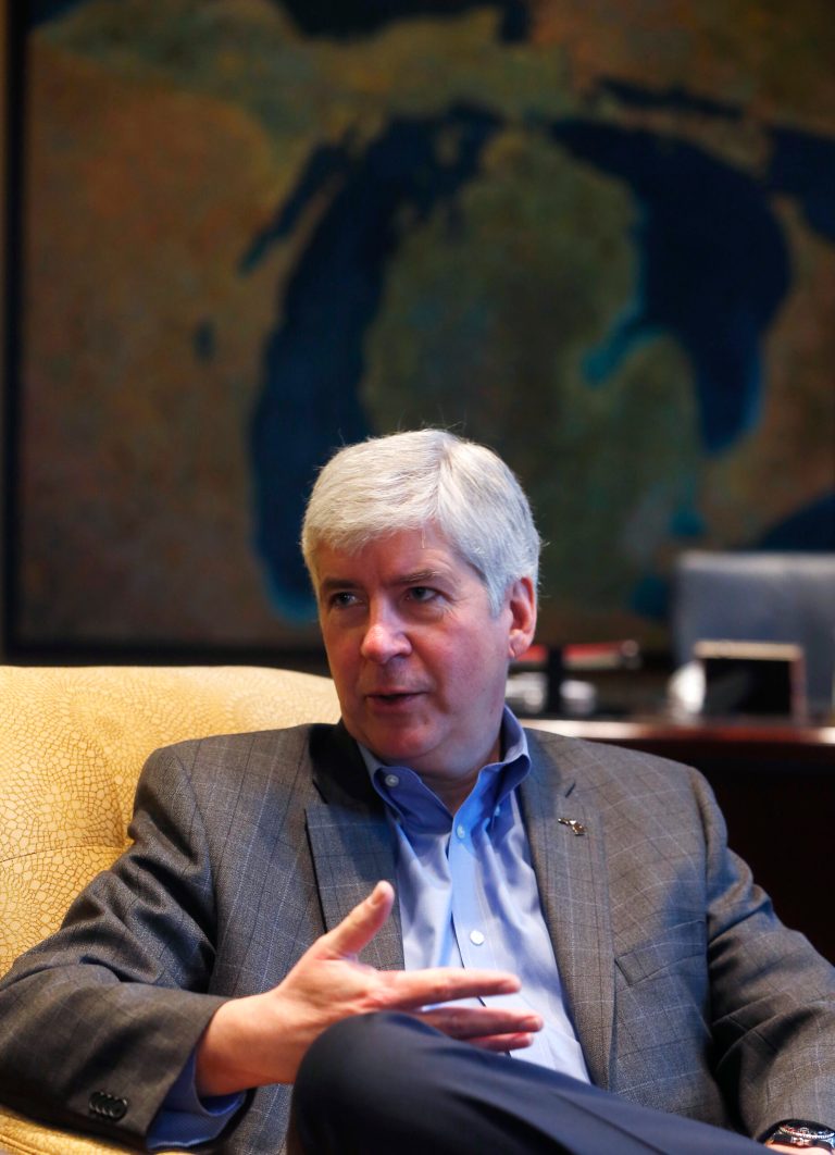   FILE - In this Dec. 17, 2012 file photo, Michigan Gov. Rick Snyder is interviewed in his office in Lansing. Snyder put a new emergency-manager law on the books in Michigan on Thursday Dec. 27 2012, weeks after voters repealed a version that gave sweeping powers to a single person to overhaul financially distressed communities. (AP Photo/Carlos Osorio, File)  
