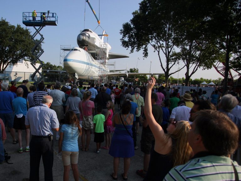 Shuttle replica hoisted atop jumbo jet in Houston