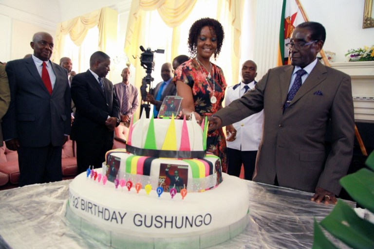Robert Mugabe, the world's oldest head of state, just celebrated his 92nd birthday with yet another million-dollar party. Even as his countrymen starve, Mugabe has never spared any expense on himself. (AP Photo)
