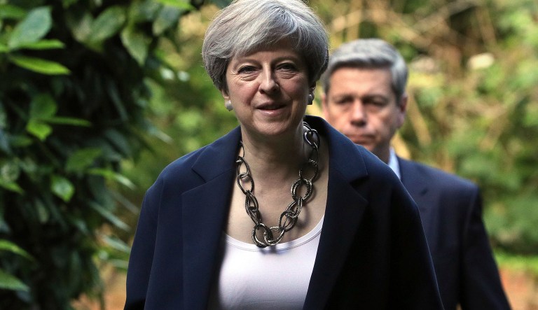 President Trump's state visit to Britain has not been postponed, a spokeswoman for Prime Minister Theresa May said Sunday. (Jonathan Brady/PA Wire/PA via AP)