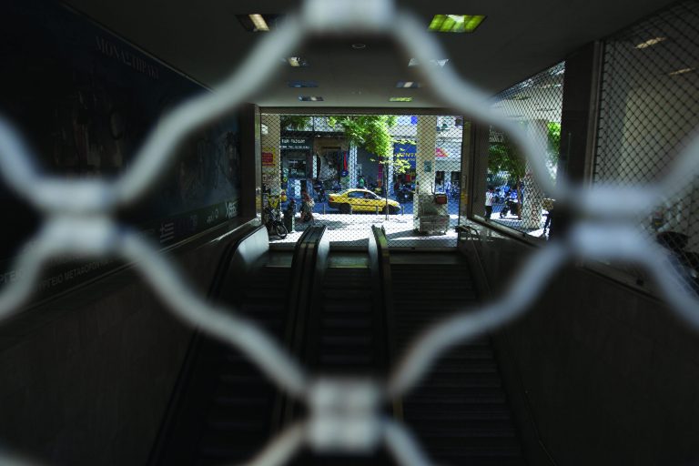 Monastiraki metro station is closed during a 24-hour strike by metro, urban railway and tram unions in Athens, Thursday, Sept. 20, 2012. Public transport workers in the Greek capital have joined a growing wave of strikes against new austerity measures that the country's creditors are demanding in return for rescue loans. (AP Photo/Thanassis Stavrakis)