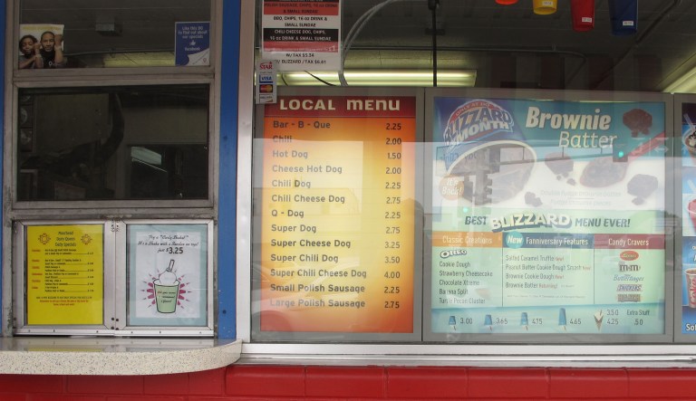 A small sign pinned to a Dairy Queen restaurant's door made its way to viral fame after a customer reported it on the company's official Facebook page, requesting that a formal censure from the overlords of icy treats be delivered to their wayward franchise. (AP Photo/Dave Kolpack)