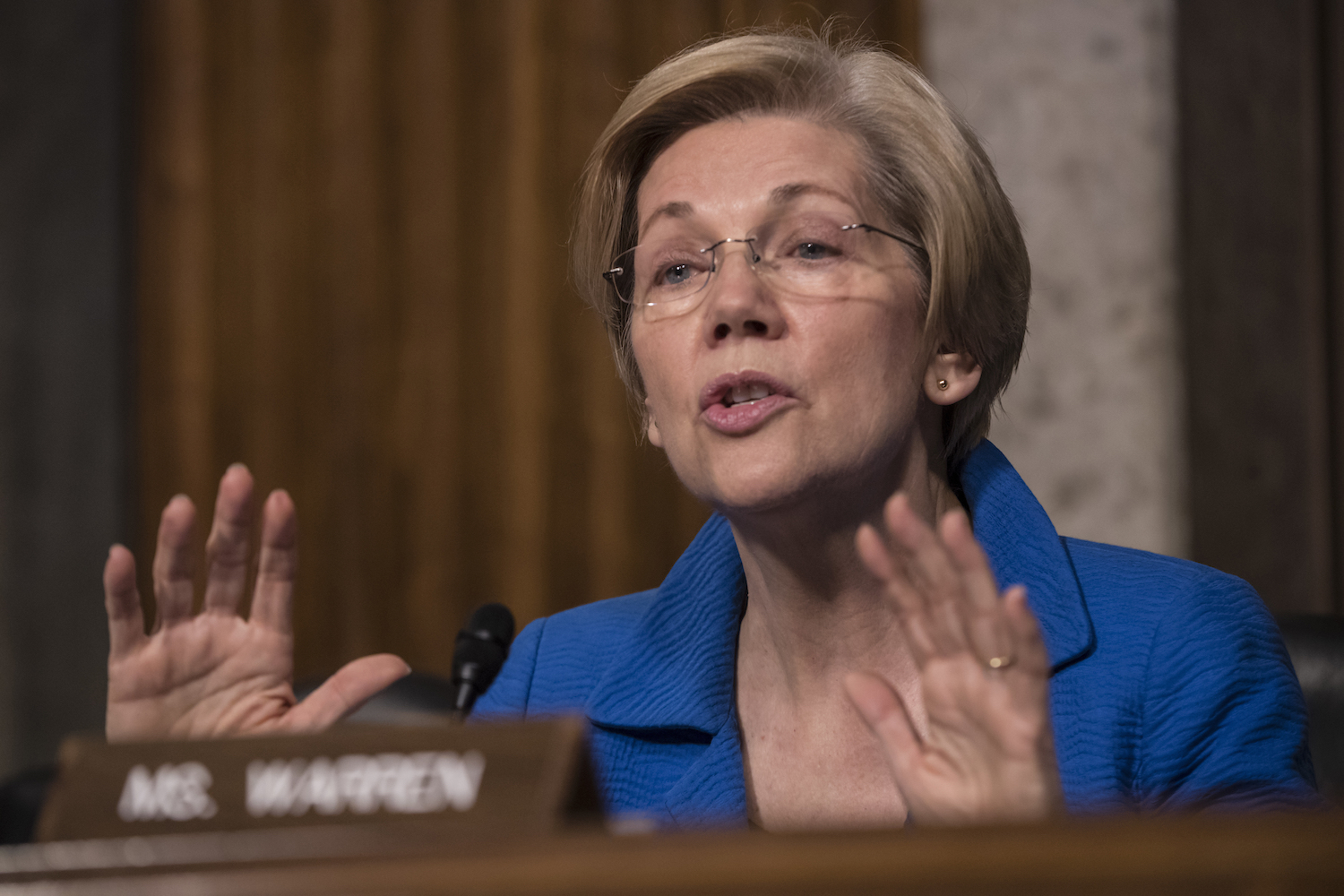 Warren defends vote for Carson amid liberal anger