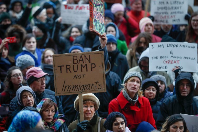 The three networks gave approximately 57 times the coverage to President Trump's executive order temporarily banning immigration from seven Middle Eastern countries than it did in the same time period for former President Obama's order permanently ending a program for Cuban refugees. (AP Photo/John Minchillo)