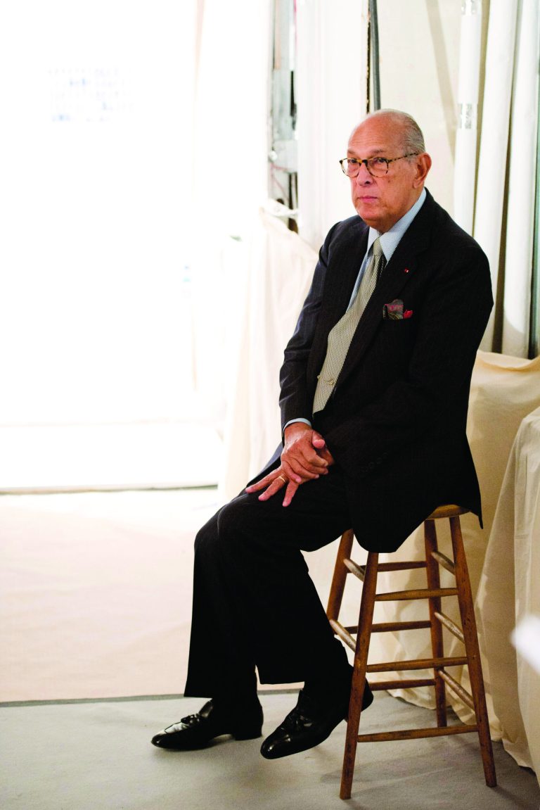 FILE - In this Feb. 14, 2012 file photo, designer Oscar de la Renta appears backstage before his collection is shown during Fashion Week in New York. De la Renta received the 2012 Couture Council Award Wednesday, Sept. 5, by The Fashion Institute of Technology in New York. (AP Photo/Charles Sykes, file)
