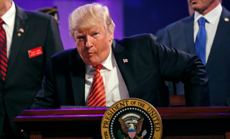 And the president reverted back to the formality of Monday's remarks with a speech in Reno, Nev., on Wednesday dedicated to veterans and national unity. (AP Photo/Alex Brandon)