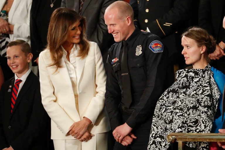 First lady Melania Trump talks with Albuquerque Police Officer Ryan Holets and this wife before the State of the Union. Holets and his wife, Rebecca, were praised by President Trump in the address for adopting the baby of a heroin-addicted mother. (AP Photo/Pablo Martinez Monsivais)