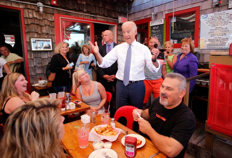 Vice President Joe Biden greets patrons at the Old Ferry Landing restaurant while making a stop for lunch in Portsmouth, N.H. Wednesday, Sept. 3, 2014. (AP Photo/Winslow Townson)