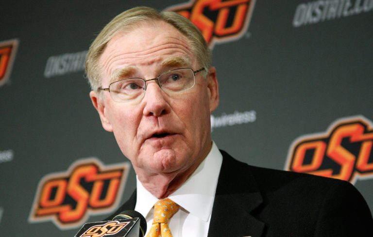   FILE - In this Friday, Nov. 18, 2011 file photo, Oklahoma State University president Burns Hargis speaks during a news conference in Stillwater, Okla. Chesapeake Energy Corp. shareholders showed their displeasure with the company's board by withholding support for two directors up for re-election at Friday's annual meeting. Both directors have tendered their resignation. Hargis is one of the two directors who resigned Friday. (AP Photo/Sue Ogrocki, File)  