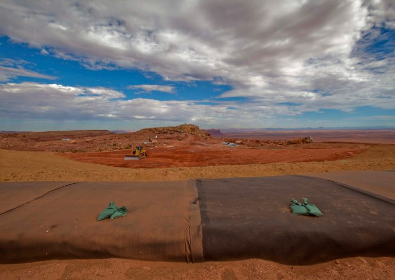 Contaminated soil is layered in a massive repository. Tailings piles where uranium was mined decades ago are now being removed by the U.S. Environmental Protection Agency. (AP Photo/Matt York)