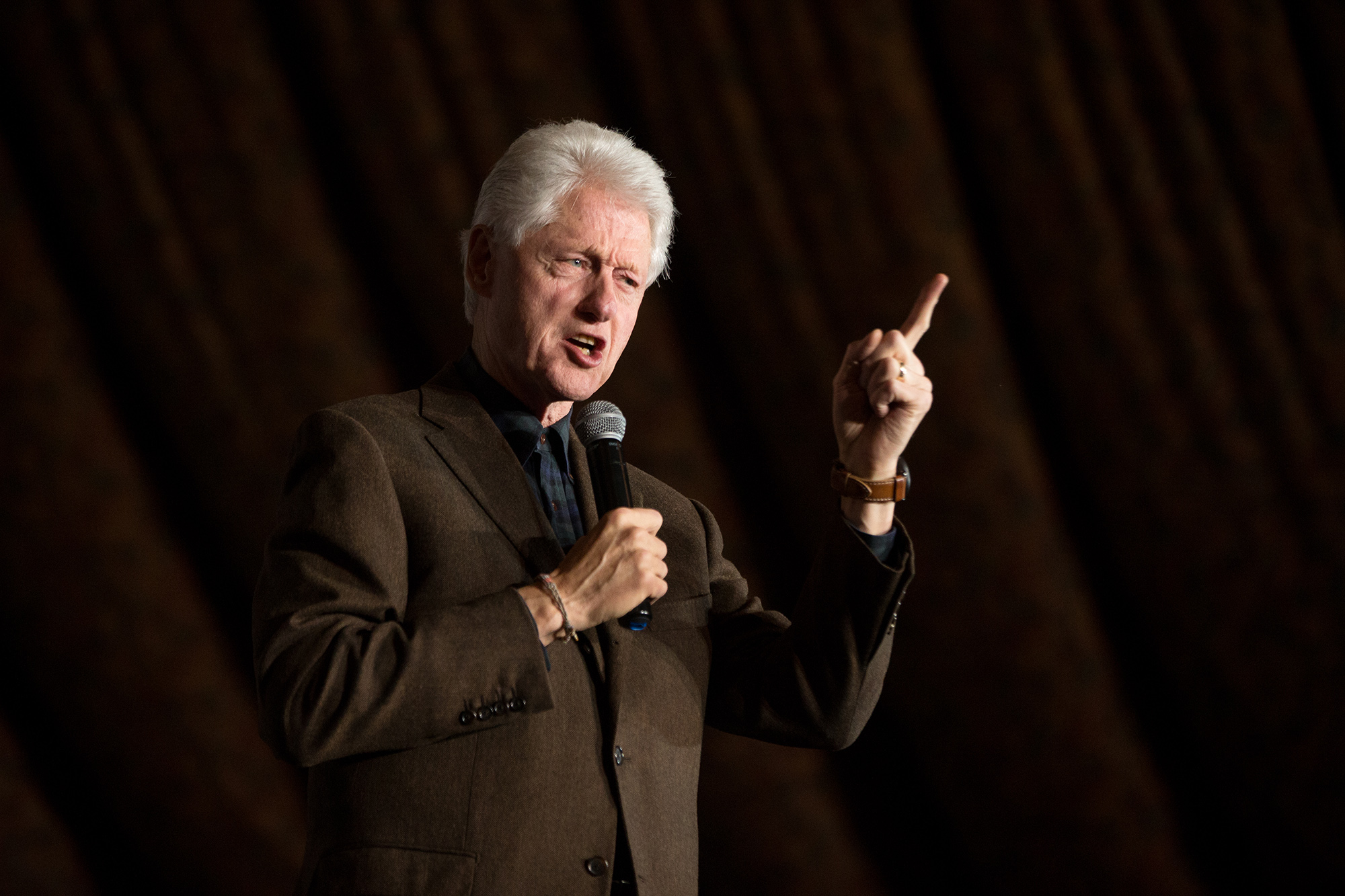 Hillary Clinton deploys husband Bill to fire up supporters as caucus nears