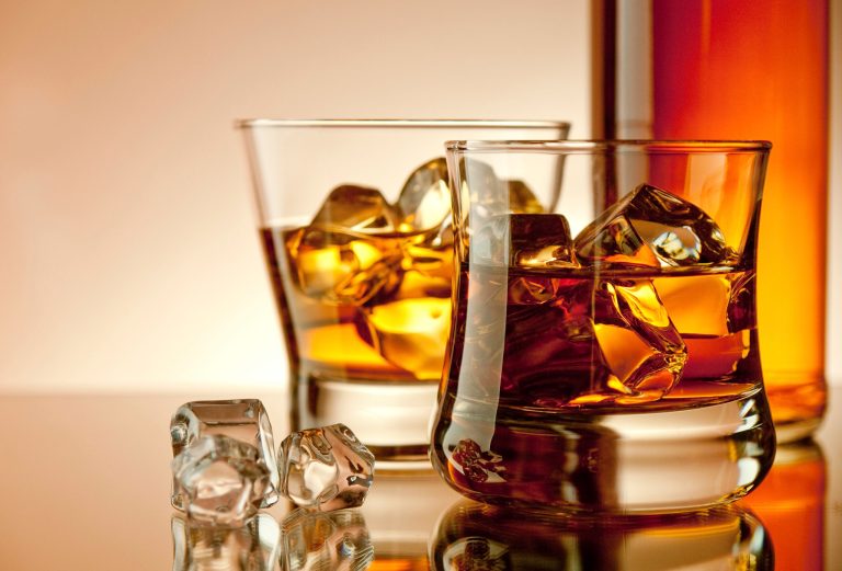 Patricia Denault poured herself a shot of Fireball cinnamon whiskey and took a picture of her son taking a sip. She posted that picture on Facebook, but someone saw that picture and called the police. (iStock Photo)
