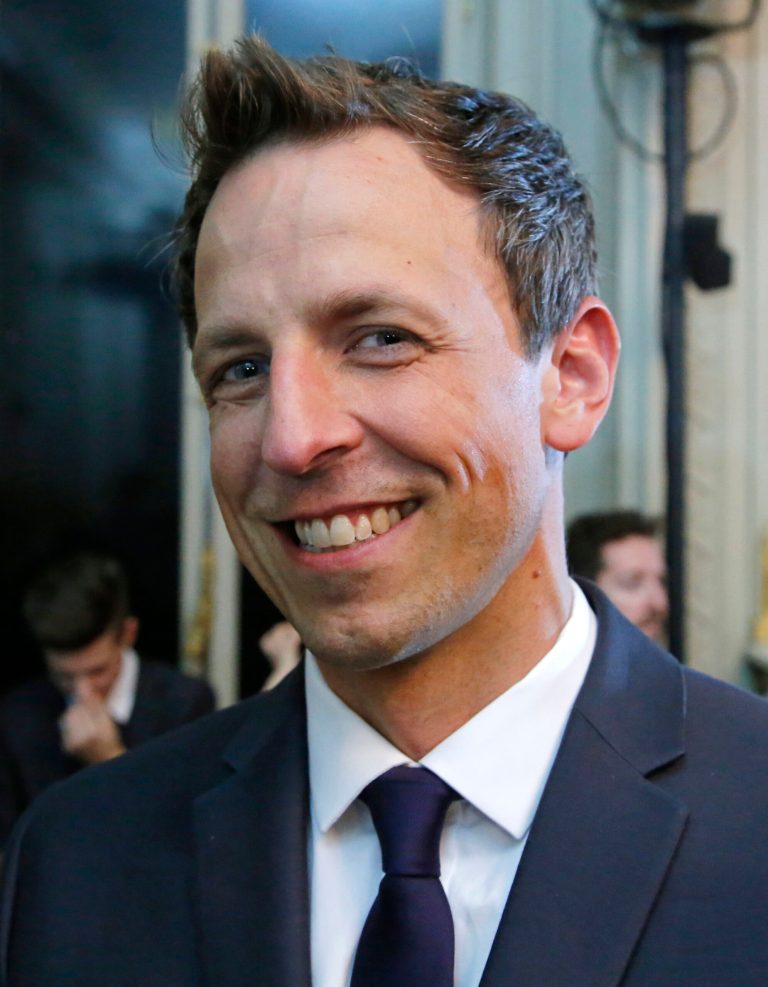 American talk show host Seth Meyers poses for photographers prior to Valentino men's Spring-Summer 2015 fashion collection presented in Paris, Wednesday, June 25, 2014. (AP Photo/Michel Euler)