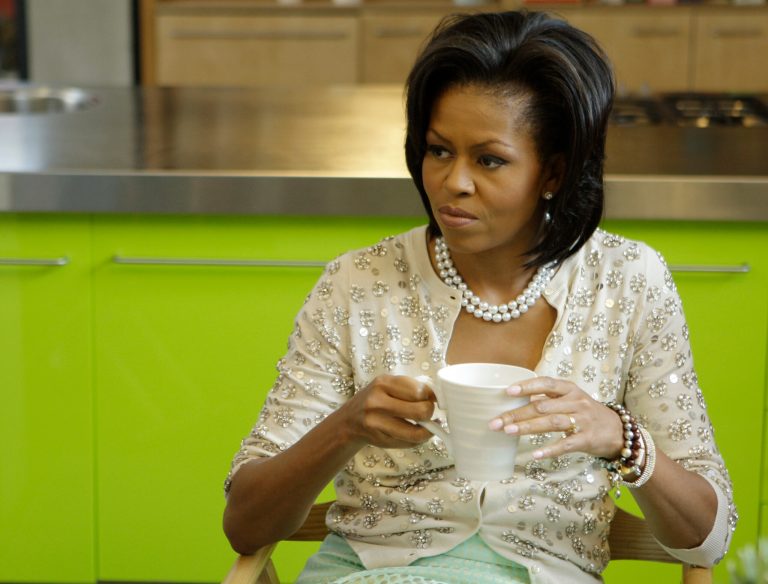 First lady Michelle Obama, who has urged Americans to exercise more and eat healthier, has a new project: encouraging the public to drink more water. (AP/Joel Ryan)