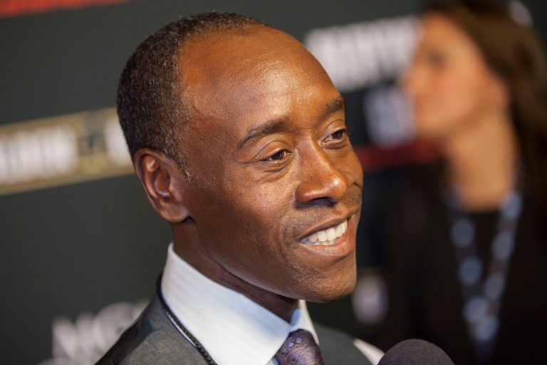 FILE - In this Sept. 14, 2013 file photo, Don Cheadle arrives at the VIP Pre-Fight Party for the One: Mayweather vs. Canelo Fight at the MGM Grand Garden Arena in  Las Vegas. The Greater Cincinnati & Northern Kentucky Film Commission announced Monday, May 12, 2014, the filming plans for the Miles Davis biopic 