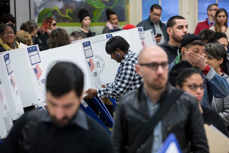 President Trump's voting fraud commission said it plans to study vulnerabilities in the federal election system that could lead to voter fraud, but Democrats believe the panel only exists to suppress voters. (AP Photo/Alexander F. Yuan)