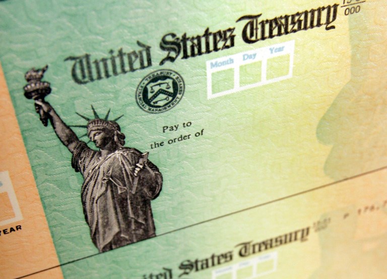 Fraud cost $2.2 billion in tax refund payouts in 2015. (AP Photo/Matt Rourke)