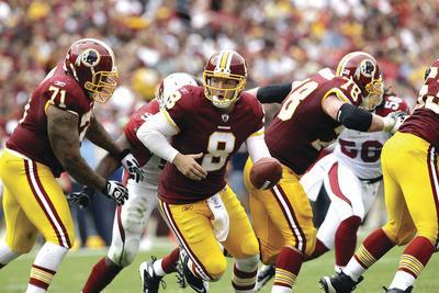 Rob Carr/Getty Images
The Redskins'offensive line helped quarterback Rex Grossman and Washington's offense gain 455 total yards last week.