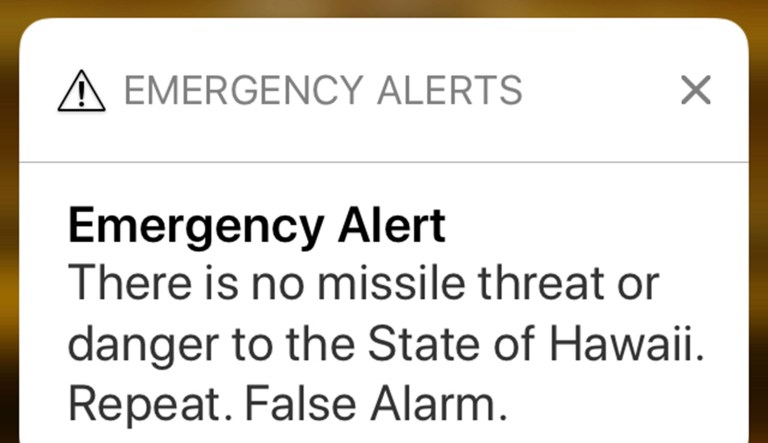 This smartphone screen capture shows the retraction of a false incoming ballistic missile emergency alert sent from the Hawaii Emergency Management Agency system on Jan. 13. On Tuesday, the employee who sent the alert was fired, and Vern Miyagi, the administrator of the Hawaii Emergency Management Agency, submitted his resignation. (AP Photo/Caleb Jones)
