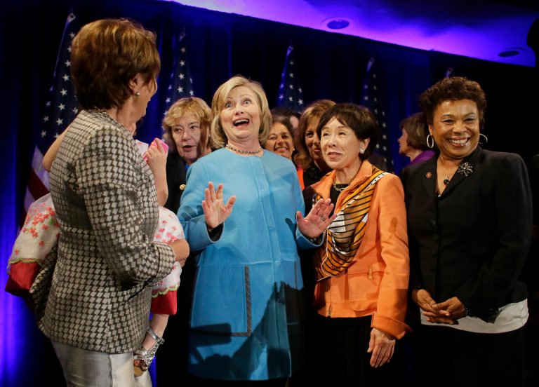 Former Secretary of State Hillary Rodham Clinton, center, gathers with House Minority Leader Nancy Pelosi, left, Rep. Zoe Lofgren, second from left, Rep. Doris Matsui, second from right, and Rep. Barbara Lee, right, for a photo after speaking at a fundraiser for Democratic congressional candidates hosted by Pelosi at the Fairmont Hotel, Monday, Oct. 20, 2014, in San Francisco. (AP Photo/Eric Risberg)