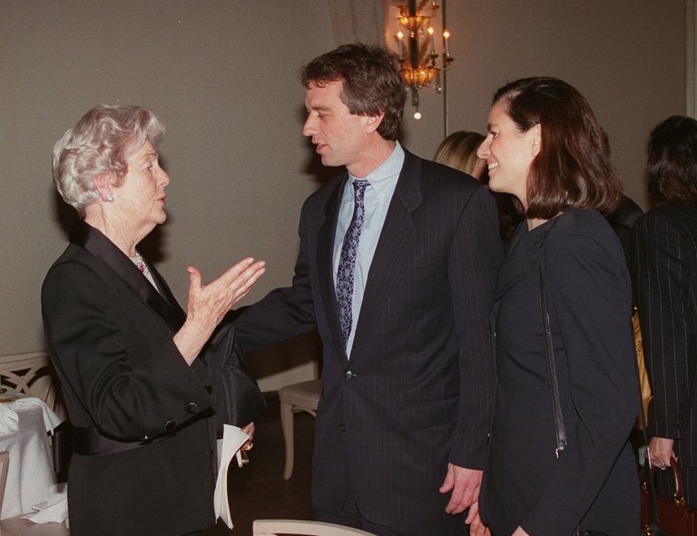 FILE - A Monday, Jan. 22, 1996 photo from files showing Deborah, Duchess of Devonshire, left, talking with Robert Kennedy Jr., center, and his wife Mary Richardson Kennedy, at a benefit for the Royal Oak Foundation, an affiliate of the National Trust of England, Wales and Northern Ireland, in New York. The last of the famous Mitford sisters, the Dowager Duchess of Devonshire, has died at the age of 94, her son has said, Wednesday, Sept. 24, 2014. (AP Photo/Trudye Connolly, File)